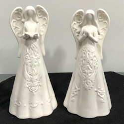 White Ceramic Angel in Savannah, MO and St. Joseph, MO